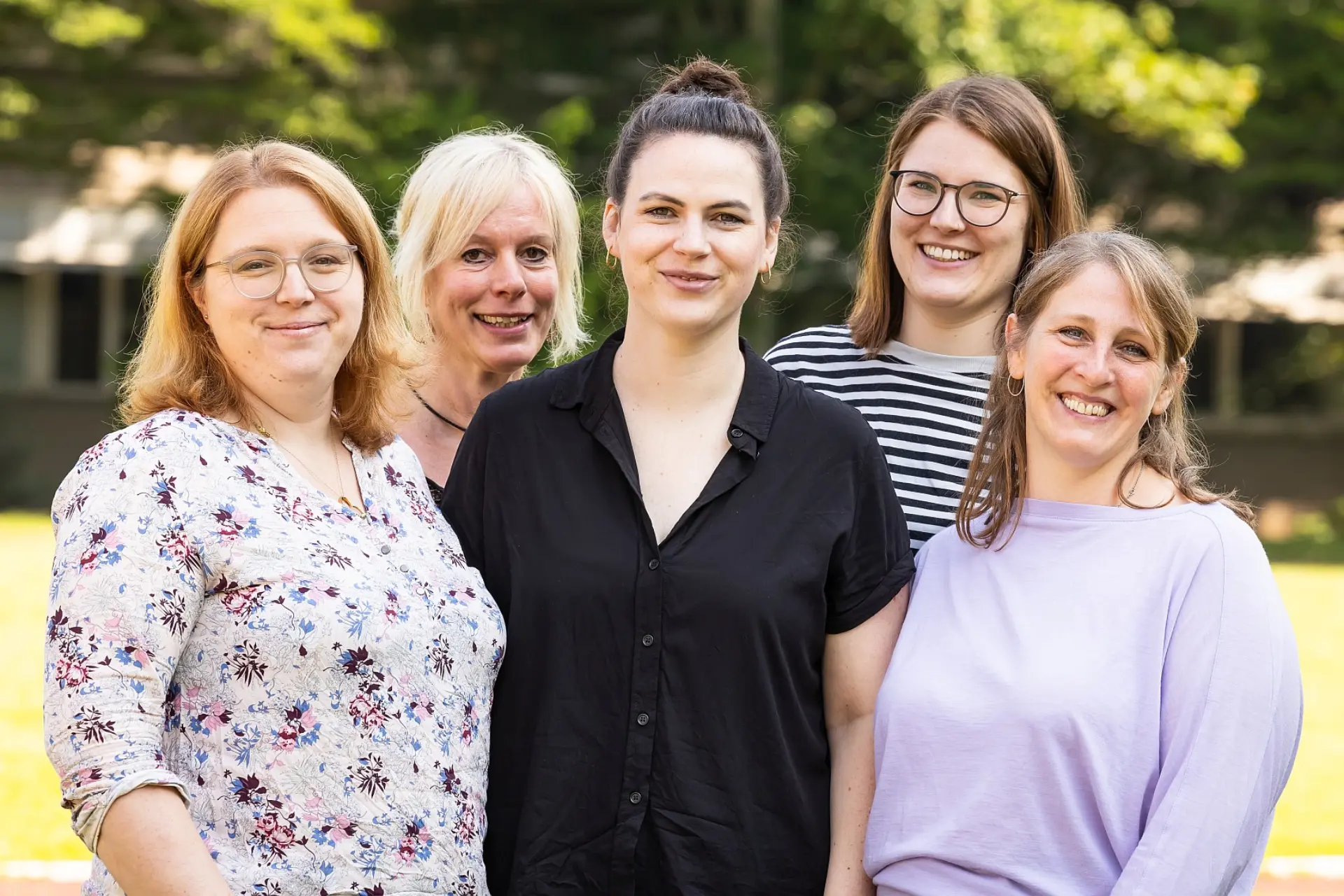 Gemeinsames Porträtfoto des fünfköpfigen UK-AT-Teams